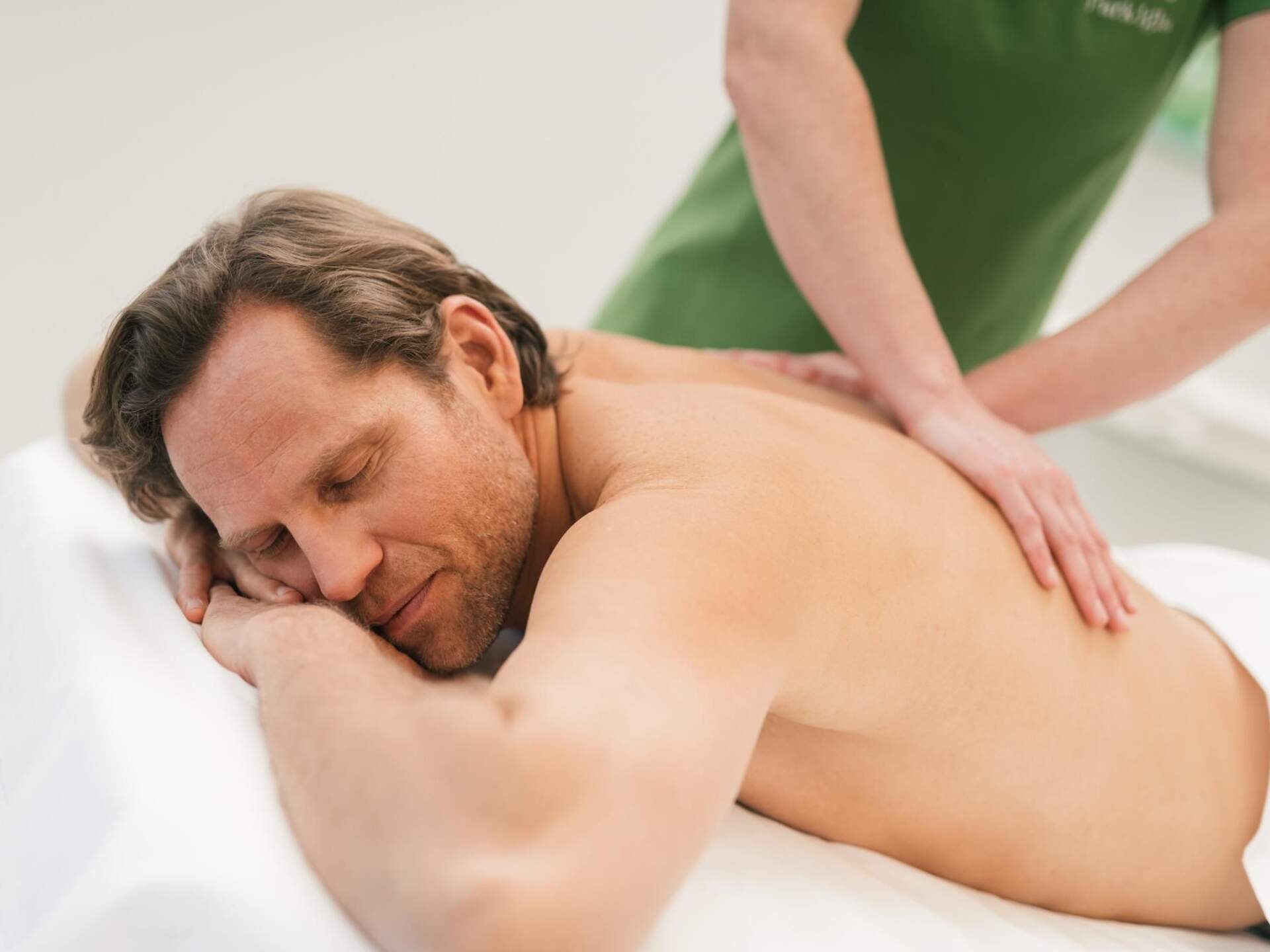 Massagebehandlung Mann